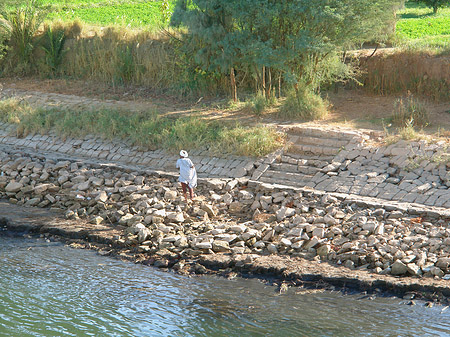 Mann am Wasser Foto 