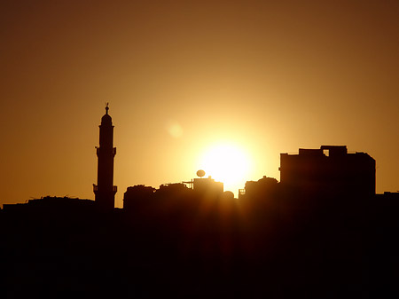 Foto Sonnenuntergang über der Stadt